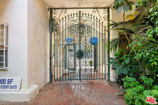 a view of a building with a street