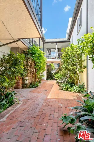 a view of a garden with a pathway