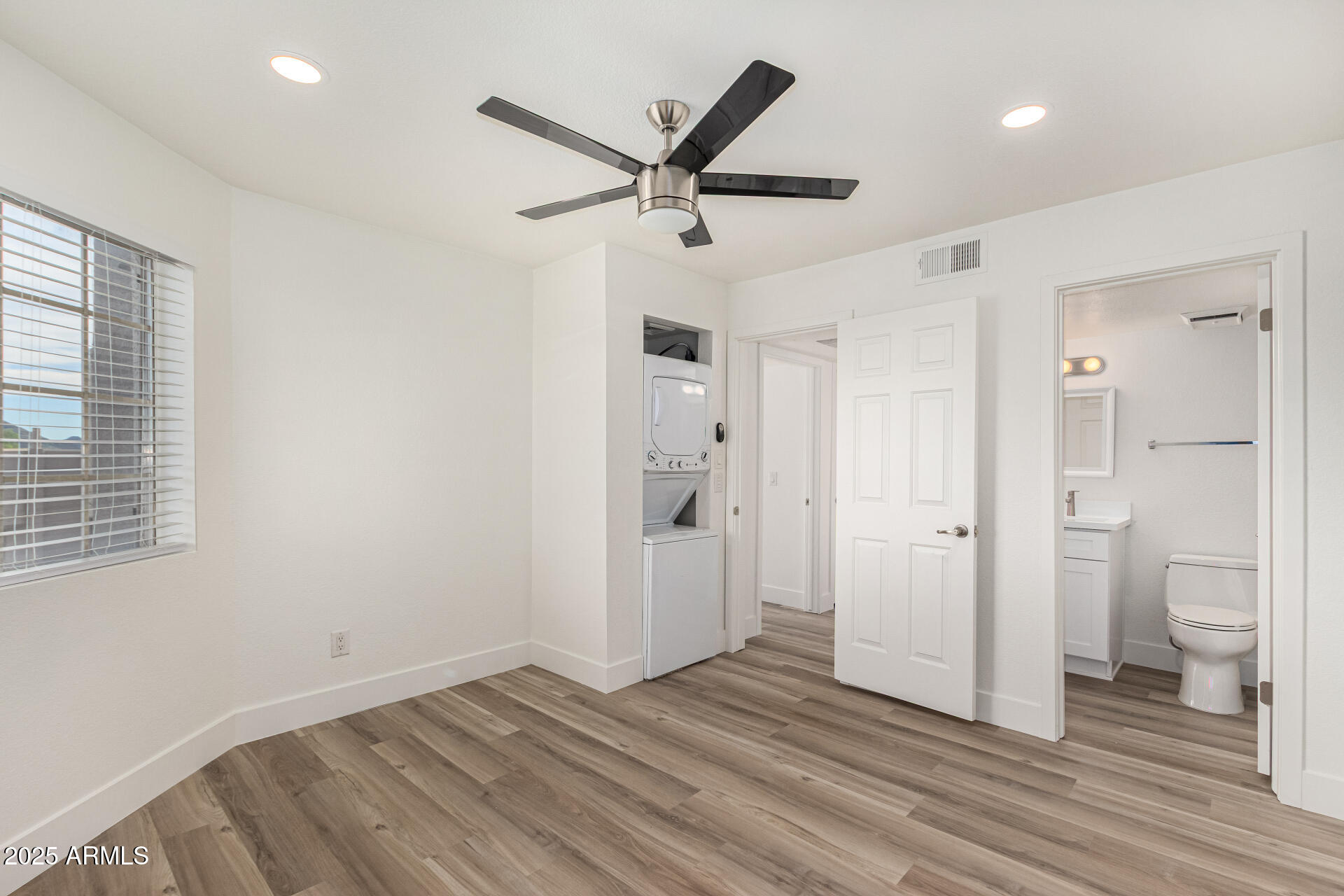 1720 East Thunderbird Road, Unit 2044 Phoenix, AZ 85022 - Photo 13 of 22 a view of a livingroom with a hardwood and a ceiling fan