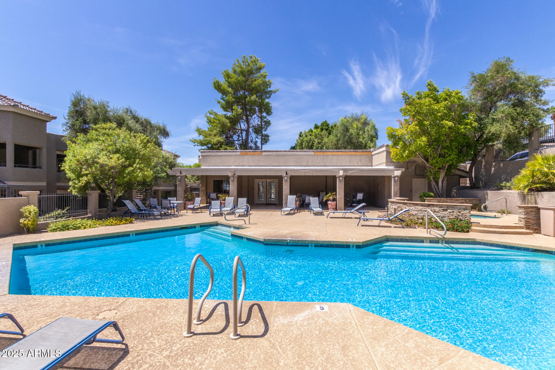 1720 East Thunderbird Road, Unit 2044 Phoenix, AZ 85022 - Photo 18 of 22 a view of house with swimming pool yard and outdoor seating