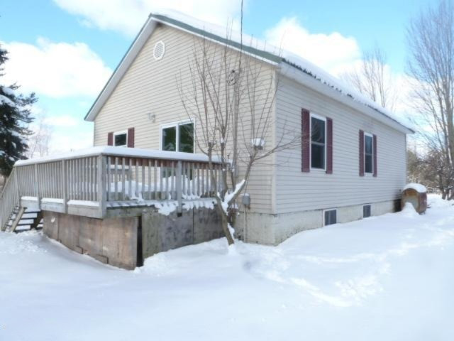 12270 Bailey Road Ravenna, MI 49451 - Photo 1 of 17 2-Right Side View