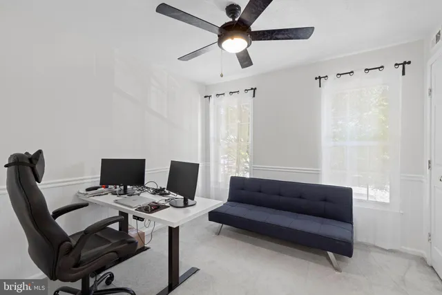 a view of workspace with wooden floor