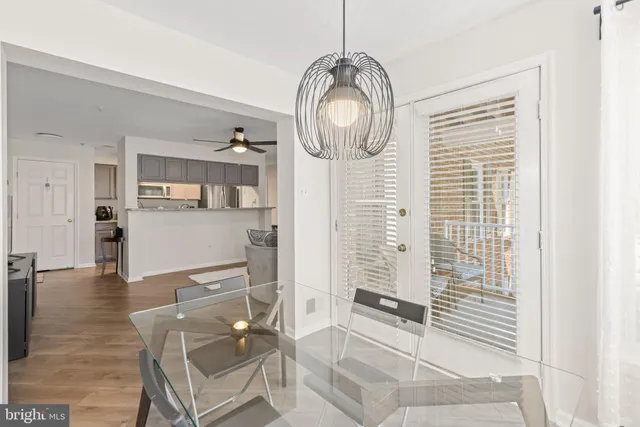 a view of dining room and wooden floor