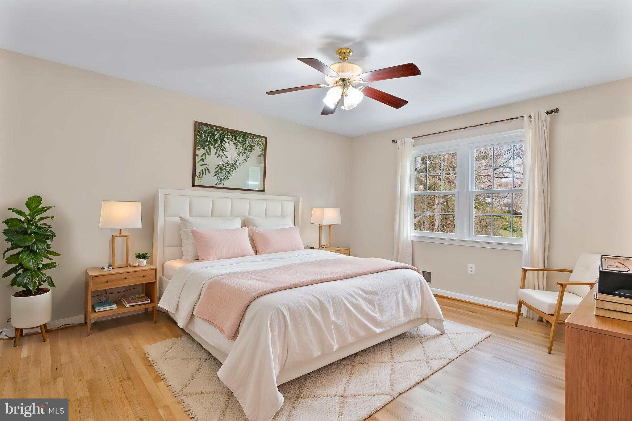 13605 Stoner Drive Silver Spring, MD 20904 - Photo 31 of 47 a bedroom with a bed and a chandelier