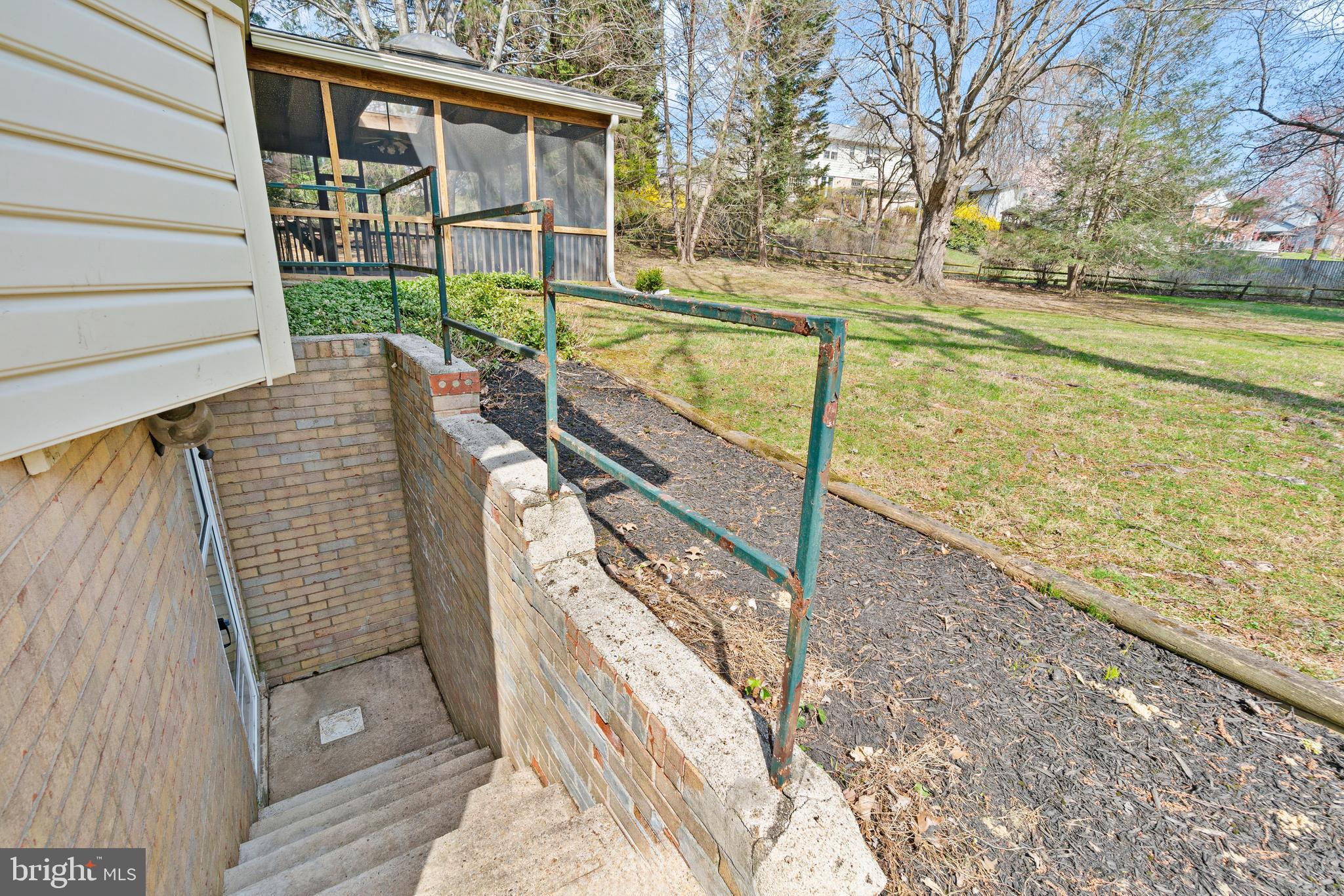 13605 Stoner Drive Silver Spring, MD 20904 - Photo 45 of 47 a view of a balcony with floor to ceiling windows with wooden floor