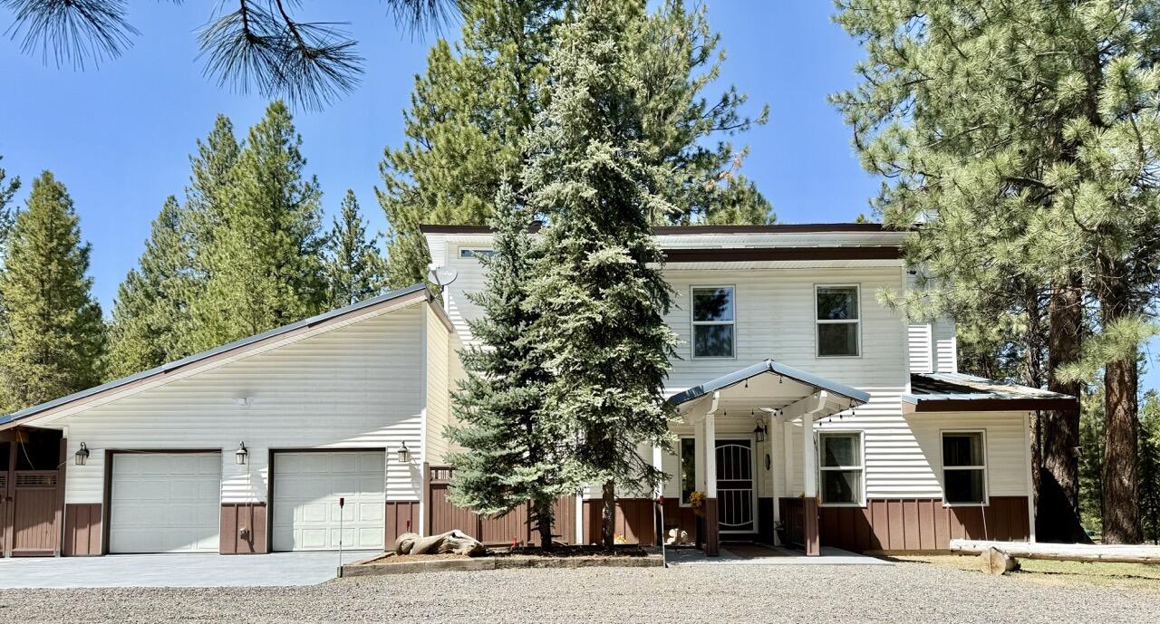 15730 Jackpine Road La Pine, OR 97739 - Photo 2 of 43 a front view of a house with a tree