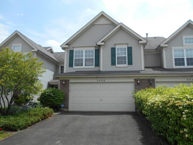 3040 Crystal Rock Road, Unit 3040 Naperville, IL 60564 - Photo 1 of 22 front view of a house with a street