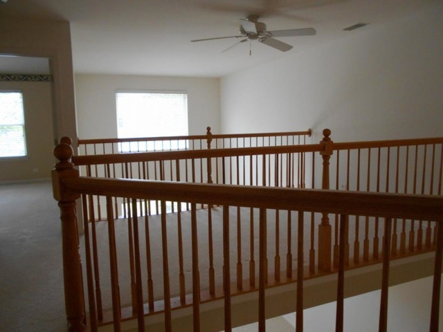 3040 Crystal Rock Road, Unit 3040 Naperville, IL 60564 - Photo 16 of 22 a view of bedroom with wooden floor
