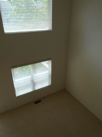 3040 Crystal Rock Road, Unit 3040 Naperville, IL 60564 - Photo 10 of 22 a view of an empty room and a window