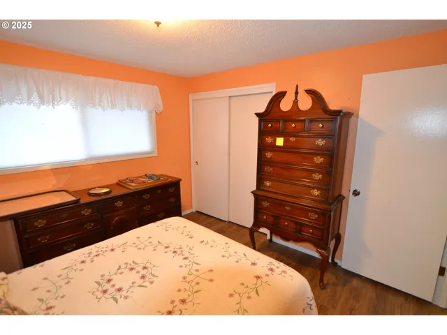 a room with furniture and a wooden floor