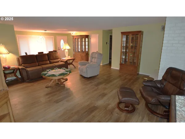 a open kitchen with a sink stove and refrigerator