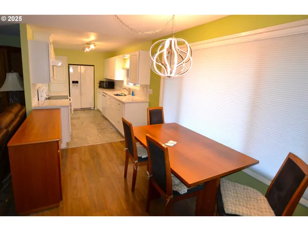 a en suite bathroom with a sink a vanity and mirror