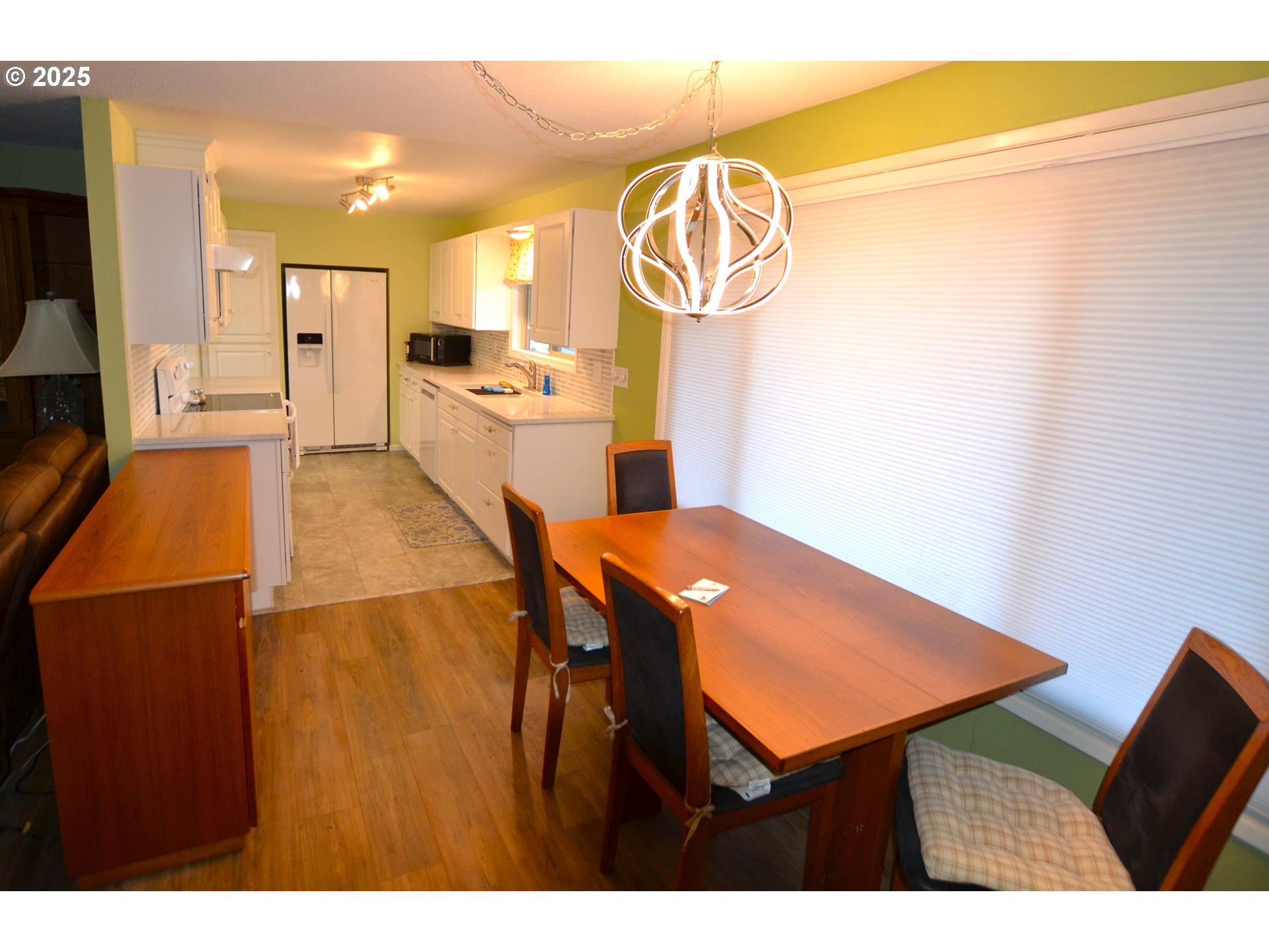 1437 Southwest 40th Street Pendleton, OR 97801 - Photo 23 of 40 a view of a kitchen with a table and a chair