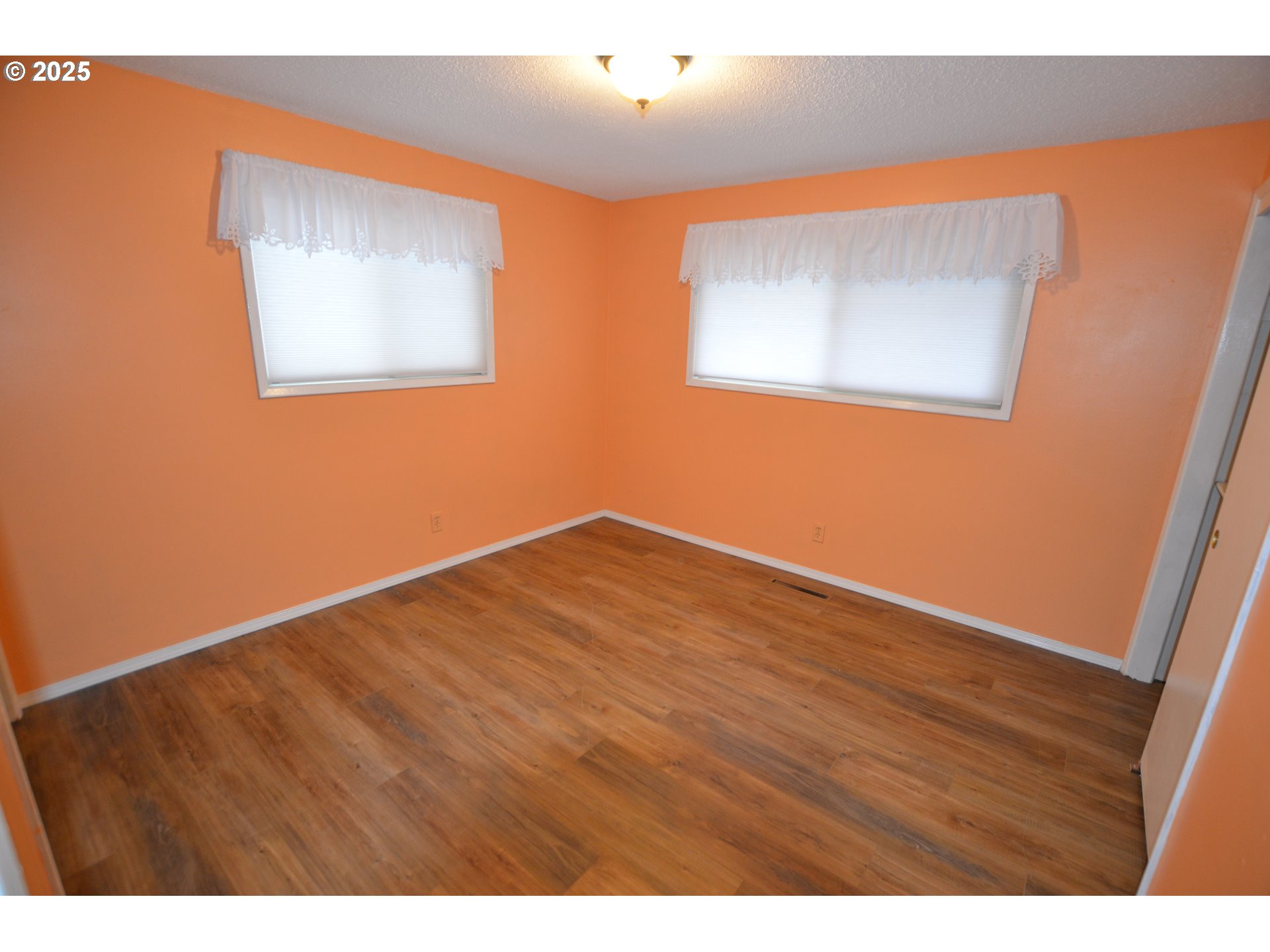 1437 Southwest 40th Street Pendleton, OR 97801 - Photo 33 of 40 a view of empty room with wooden floor