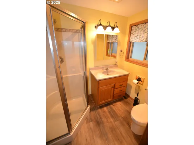 a bathroom with a tub and shower