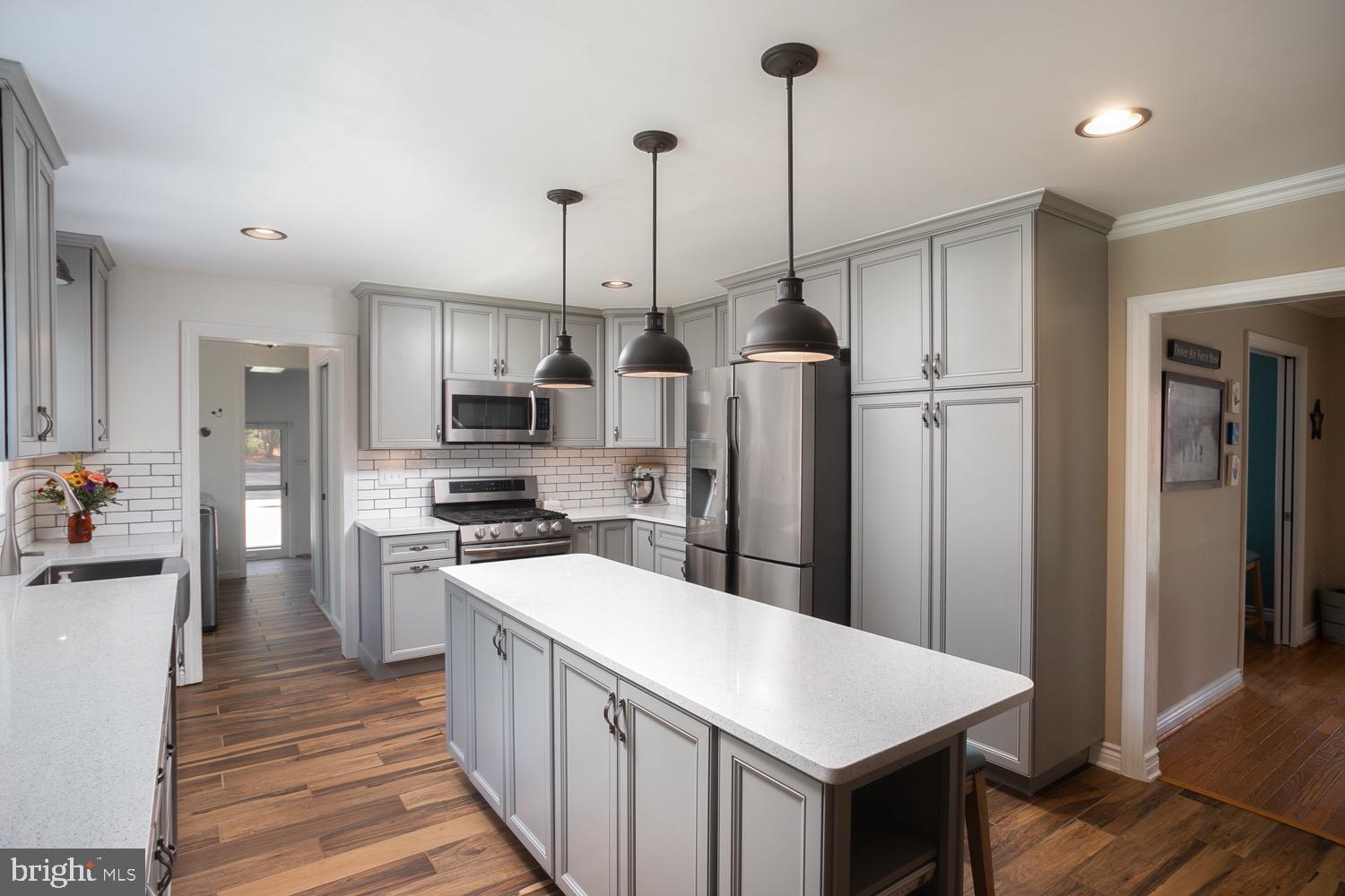 549 McKendimen Road Medford, NJ 08055 - Photo 14 of 37 Quartz countertops and subway tile backsplash