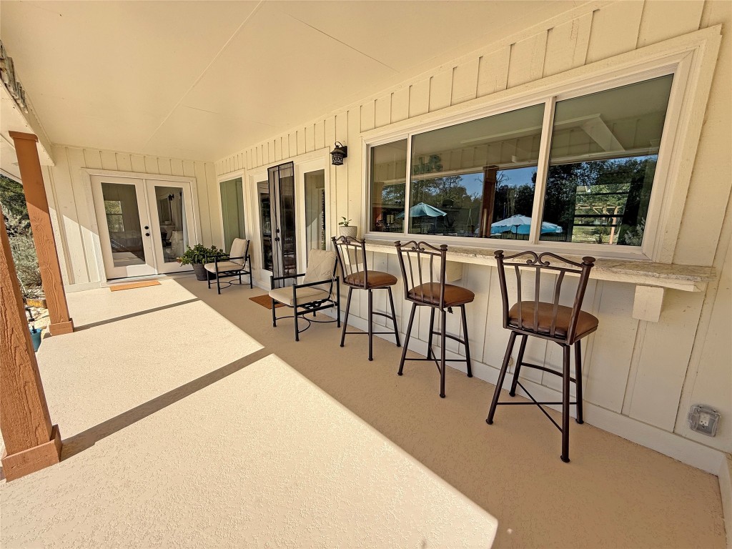 3400 Deer Trail Georgetown, TX 78628 - Photo 32 of 40 Back porch bar with pass through window to the kitchen