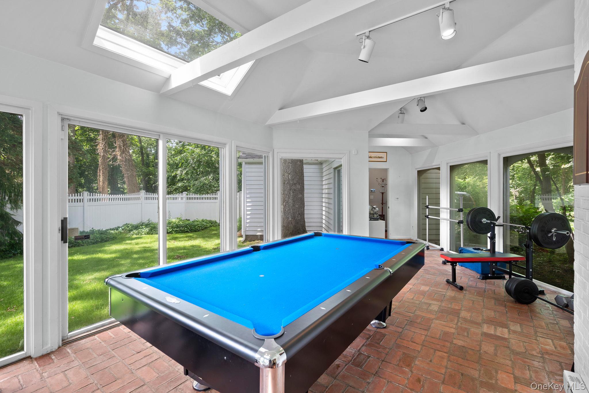 342 Woodbury Road Cold Spring Harbor, NY 11724 - Photo 13 of 29 a room with pool table and windows