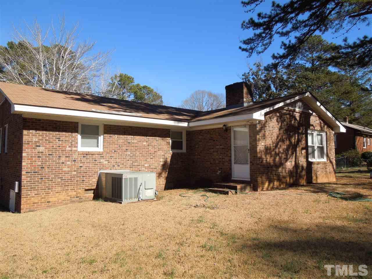 529 Maple Lane Raleigh, NC 27603 - Photo 16 of 21 a front view of a house with a yard