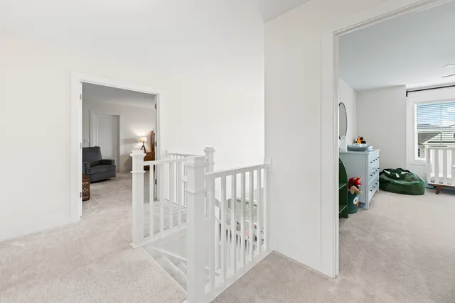 a view of a bathroom from a hallway