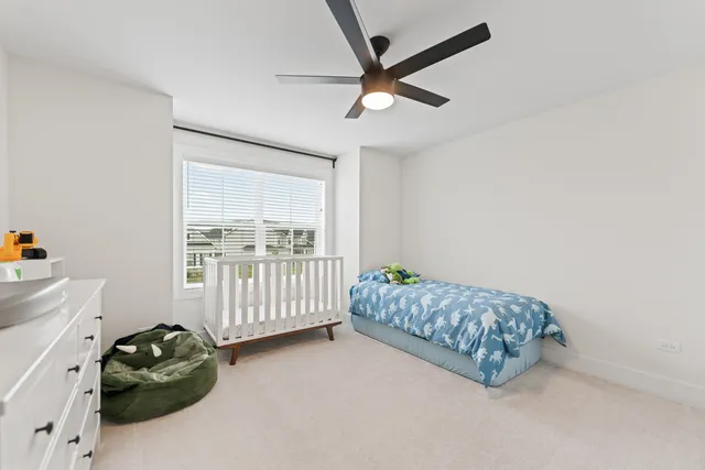 a view of a room with wooden walls
