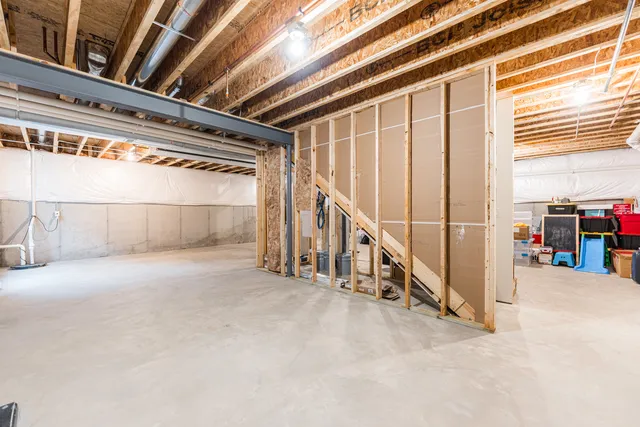 an aerial view of a house with outdoor space pool seating area and yard