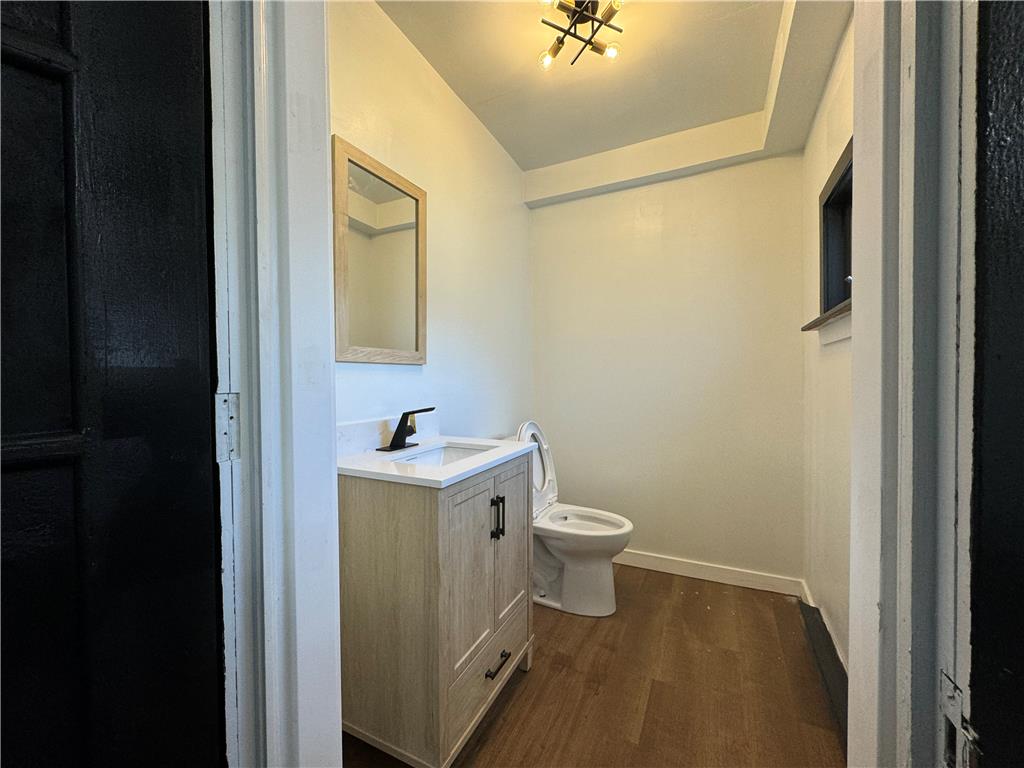 200 South Coal Street Shamokin, PA 17872 - Photo 6 of 18 An updated vanity and modern lighting complete this functional half bathroom.