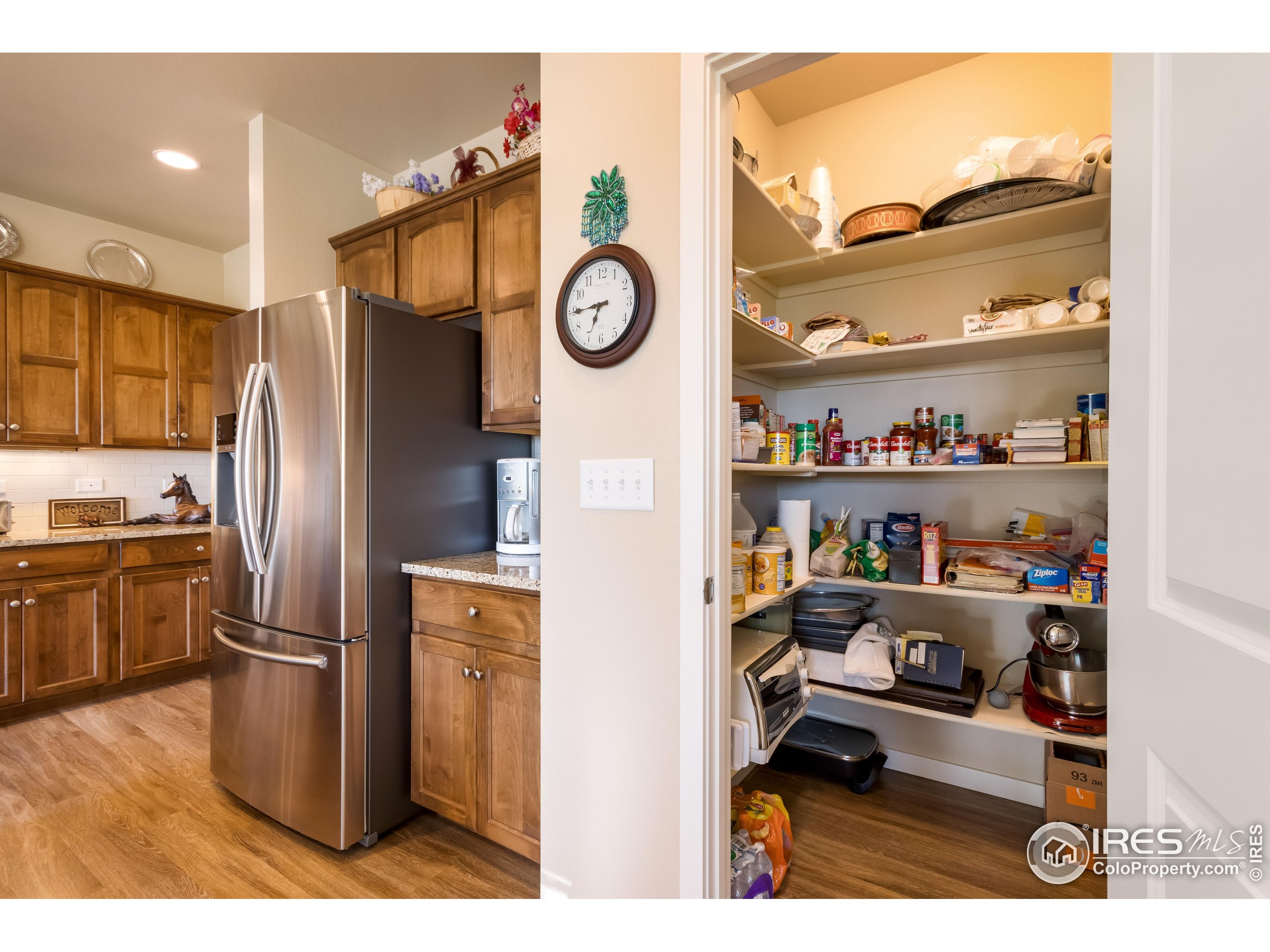 7213 Horsechestnut Street Wellington, CO 80549 - Photo 15 of 39 a kitchen with refrigerator and cabinets