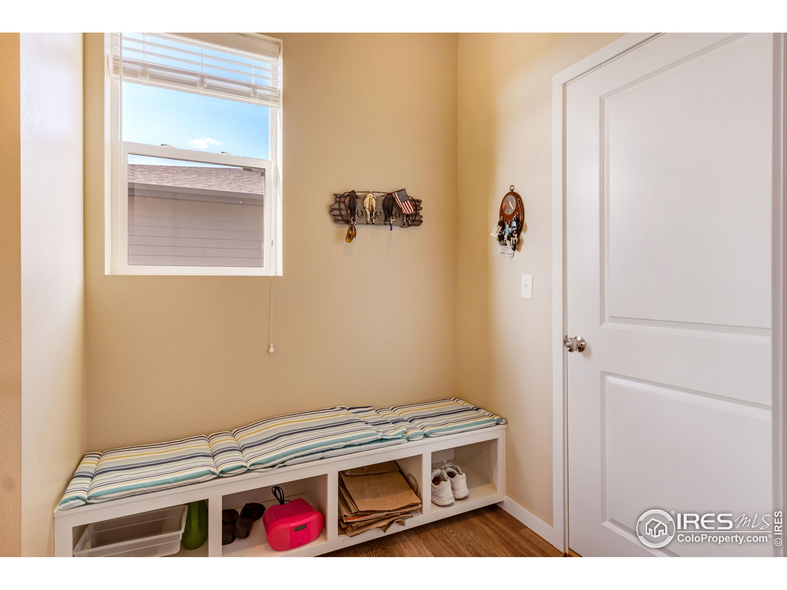7213 Horsechestnut Street Wellington, CO 80549 - Photo 19 of 39 a bathroom with a sink and a shower