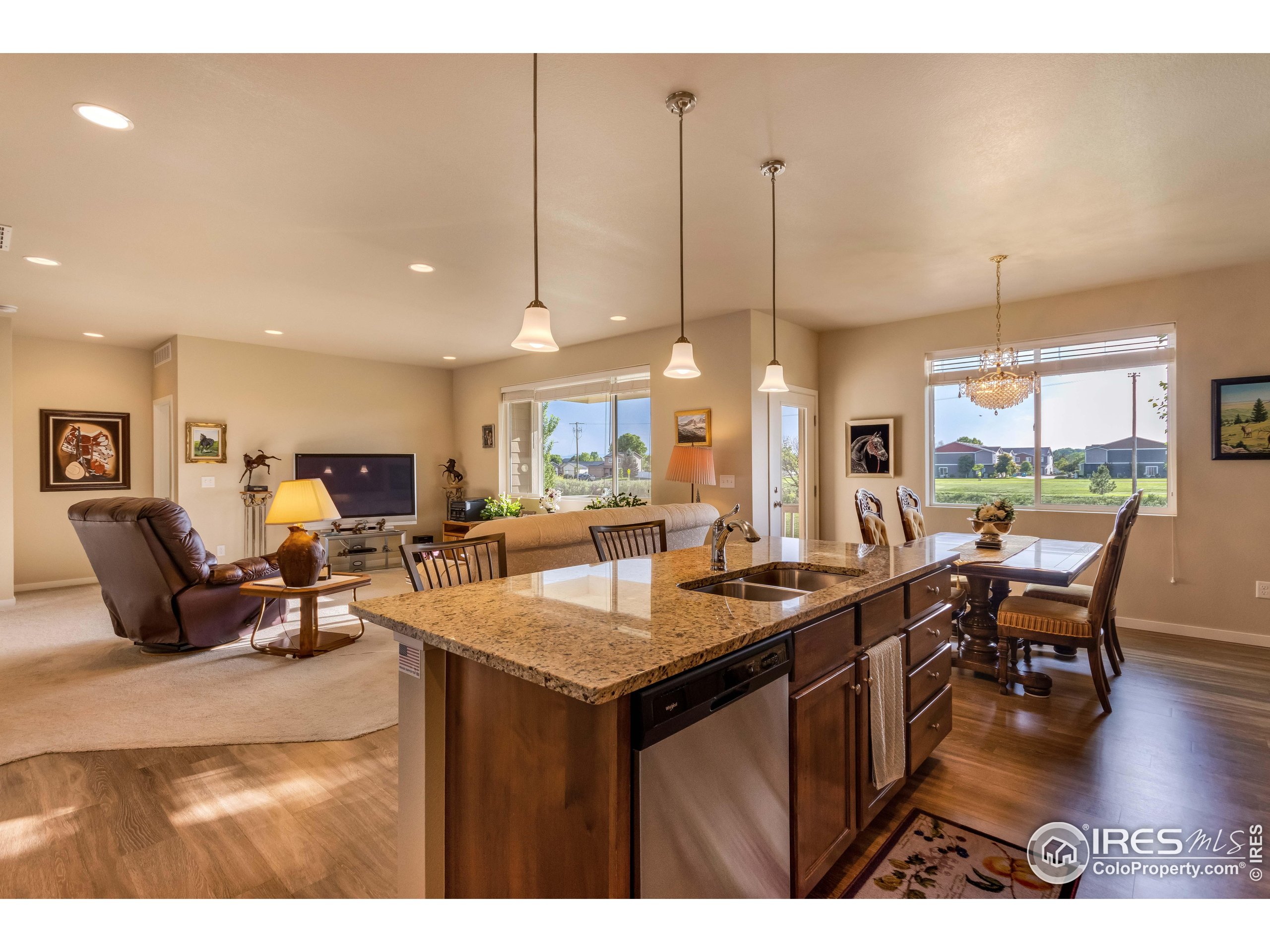 7213 Horsechestnut Street Wellington, CO 80549 - Photo 22 of 39 a kitchen with lots of counter top space