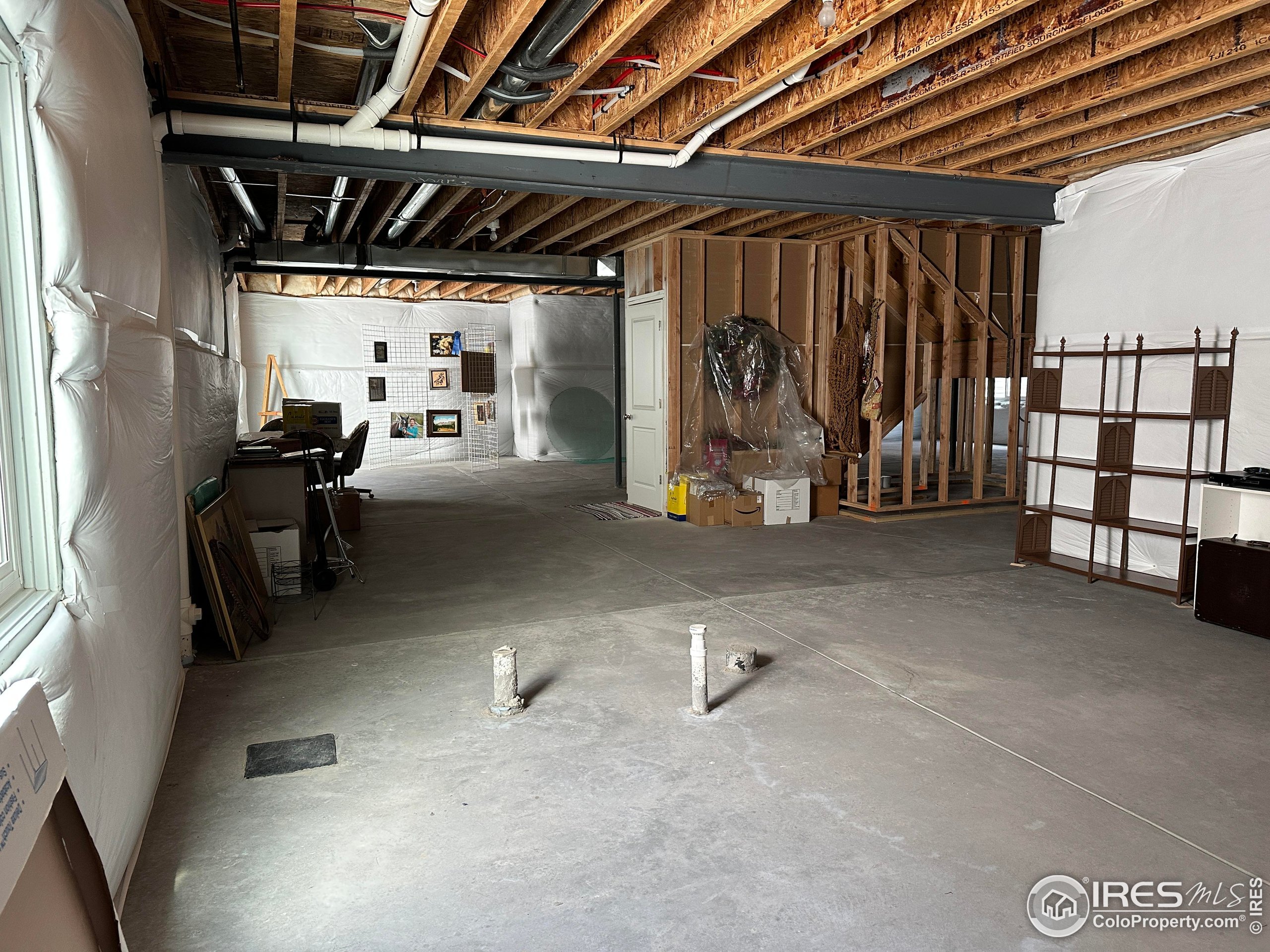 7213 Horsechestnut Street Wellington, CO 80549 - Photo 31 of 39 a view of storage and utility room
