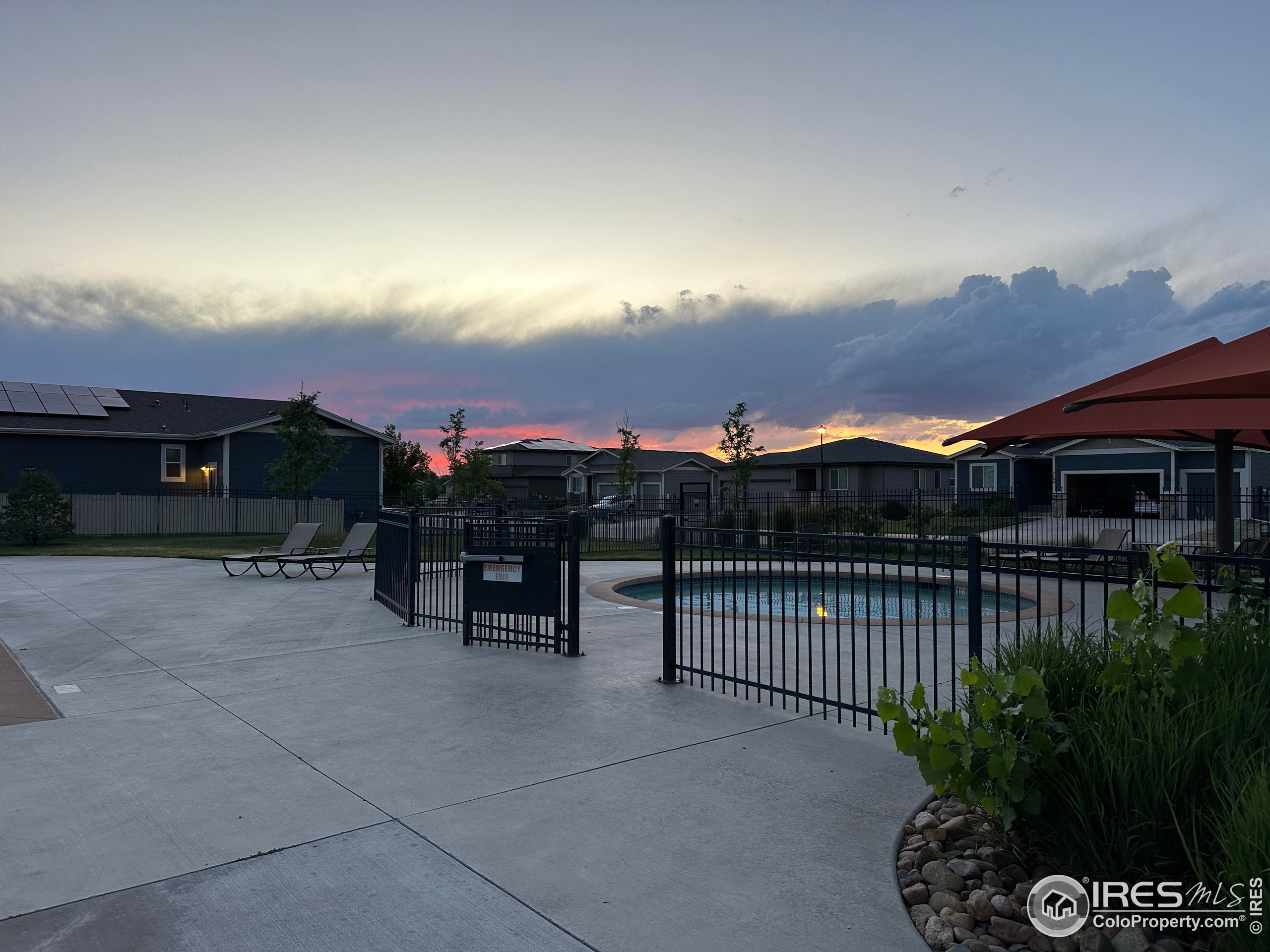 7213 Horsechestnut Street Wellington, CO 80549 - Photo 38 of 39 a view of a terrace with sitting area