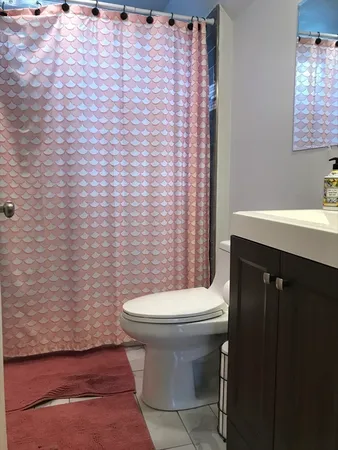 a bathroom with a sink and a toilet