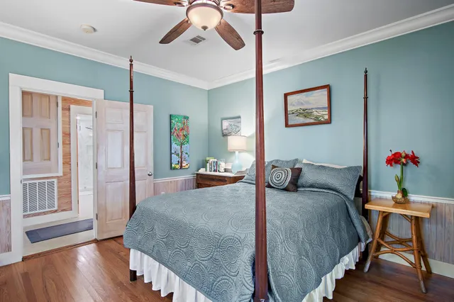 a bedroom with furniture and a window