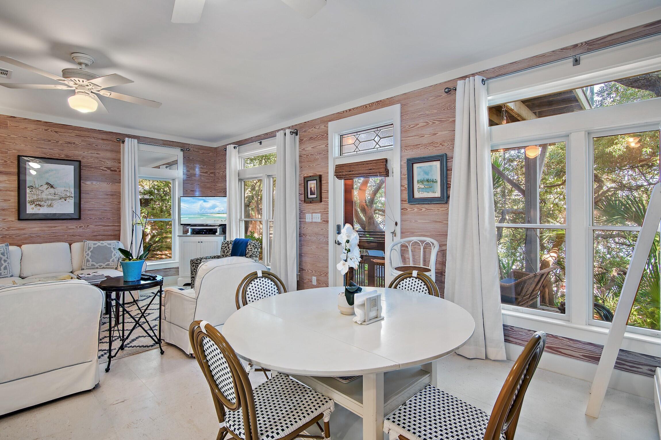 291 South Gulf Drive Santa Rosa Beach, FL 32459 - Photo 2 of 23 a view of a dining room with furniture window and outside view