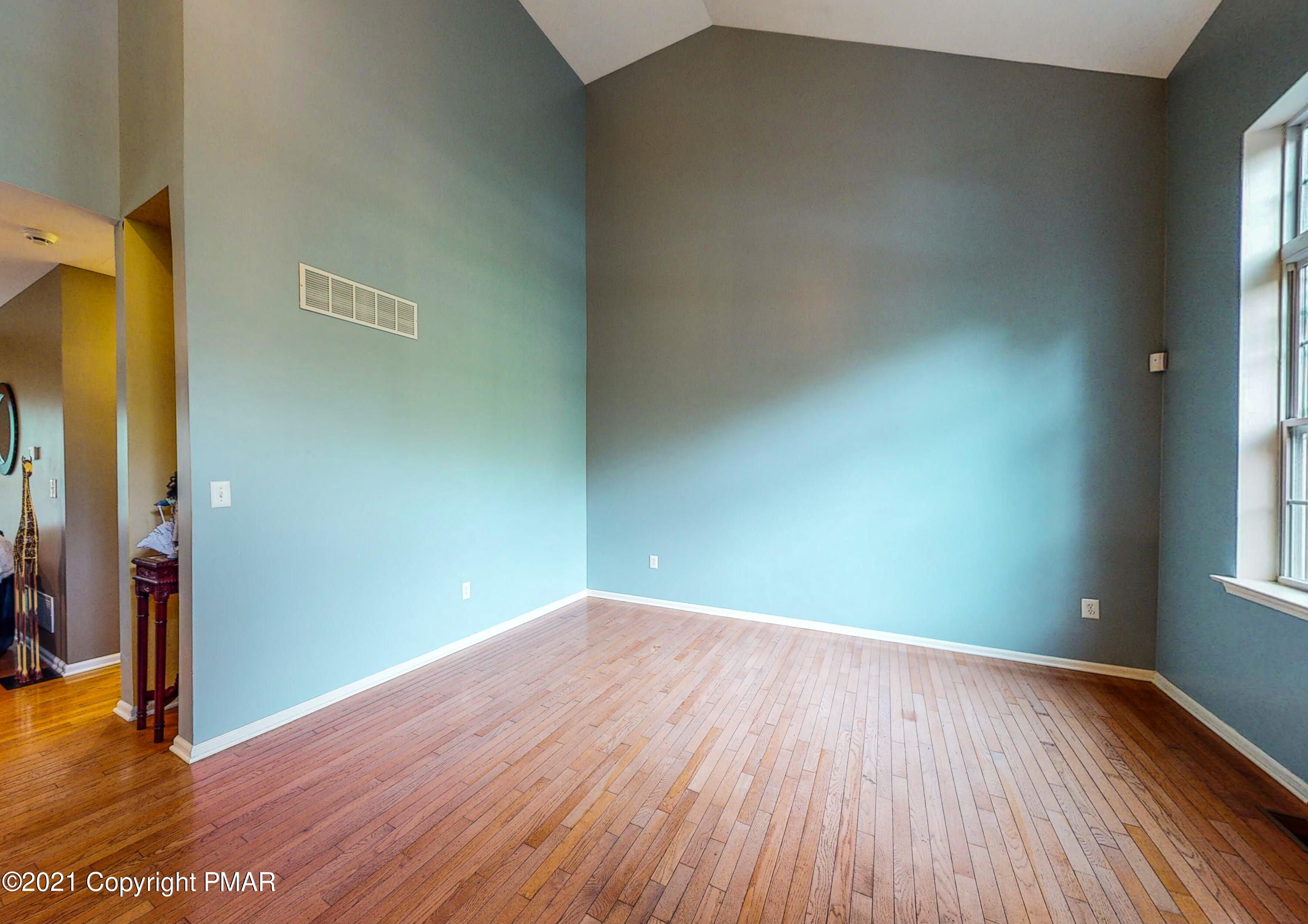 5631 Decker Road Bushkill, PA 18324 - Photo 19 of 61 a view of empty room with wooden floor