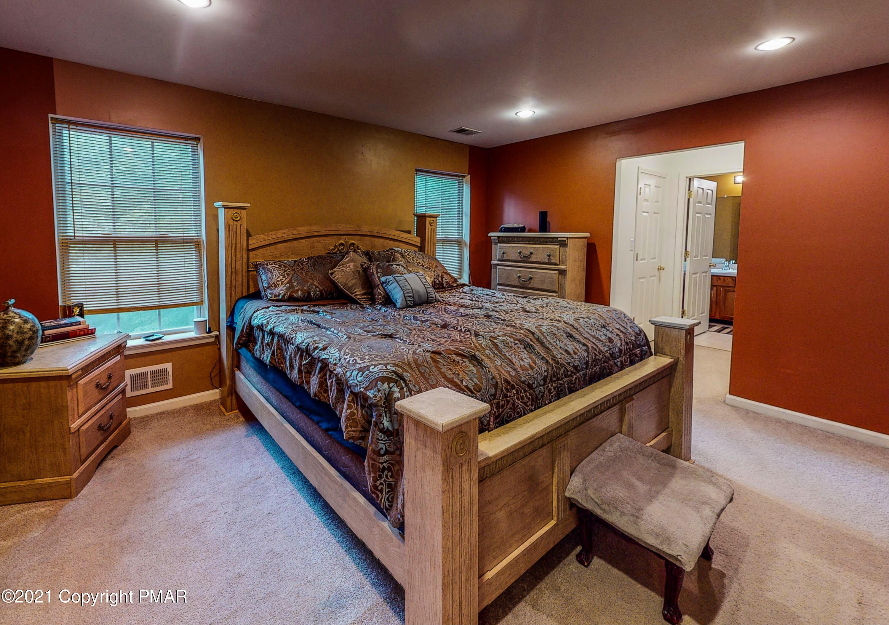 5631 Decker Road Bushkill, PA 18324 - Photo 25 of 61 a bed room with a bed and a couch