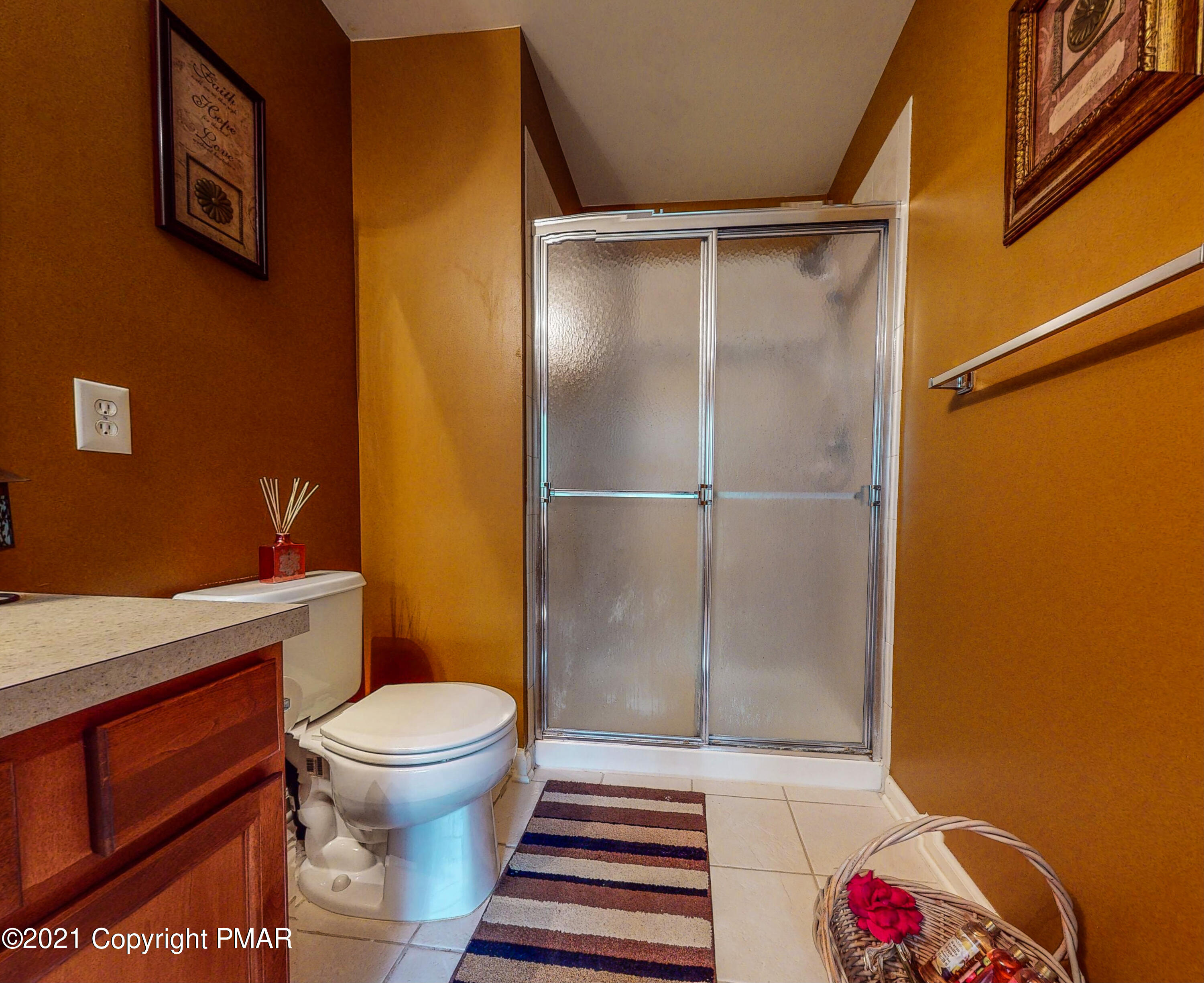 5631 Decker Road Bushkill, PA 18324 - Photo 29 of 61 a bathroom with a toilet and a shower