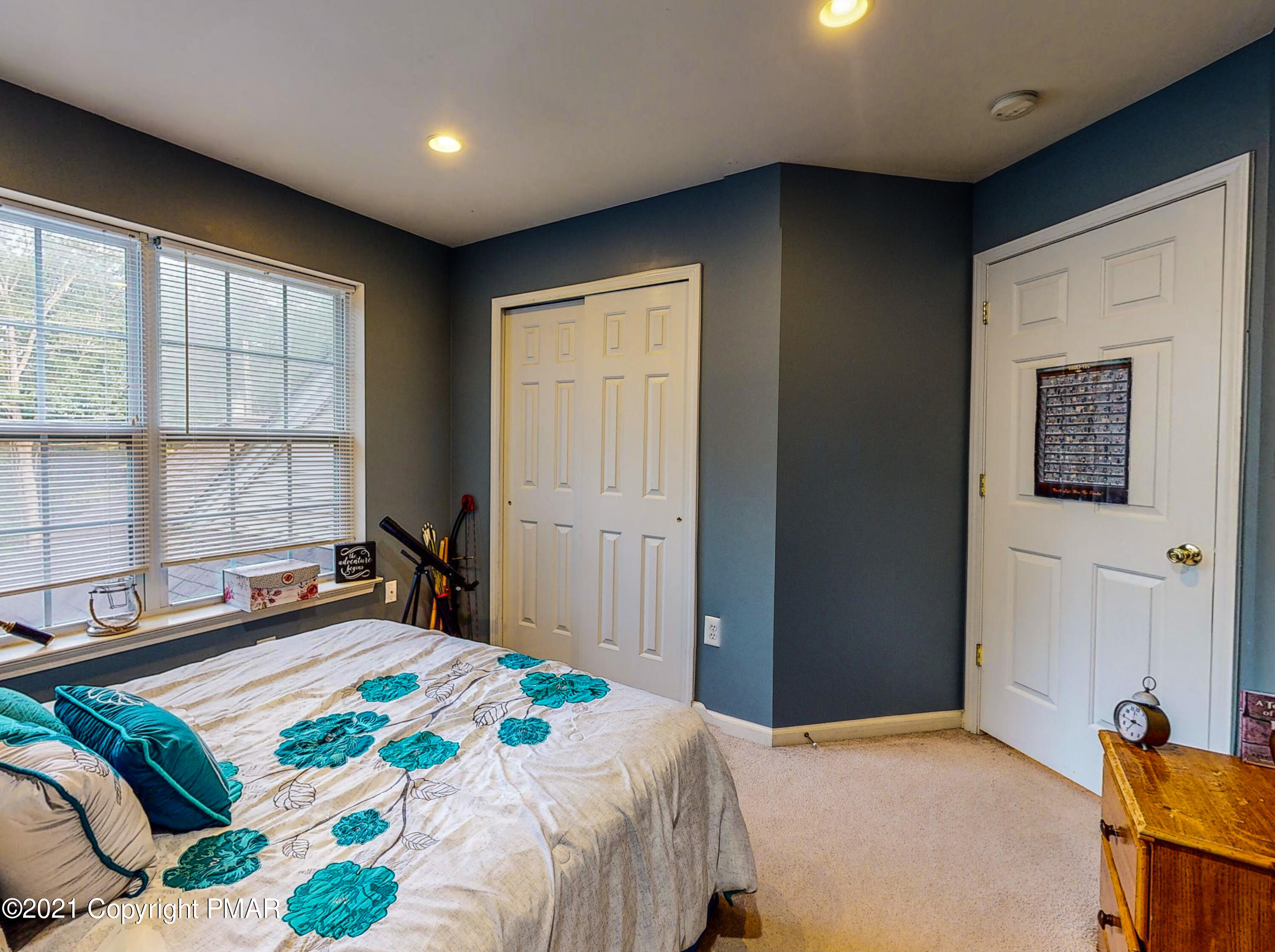 5631 Decker Road Bushkill, PA 18324 - Photo 35 of 61 a bedroom with a bed and a window