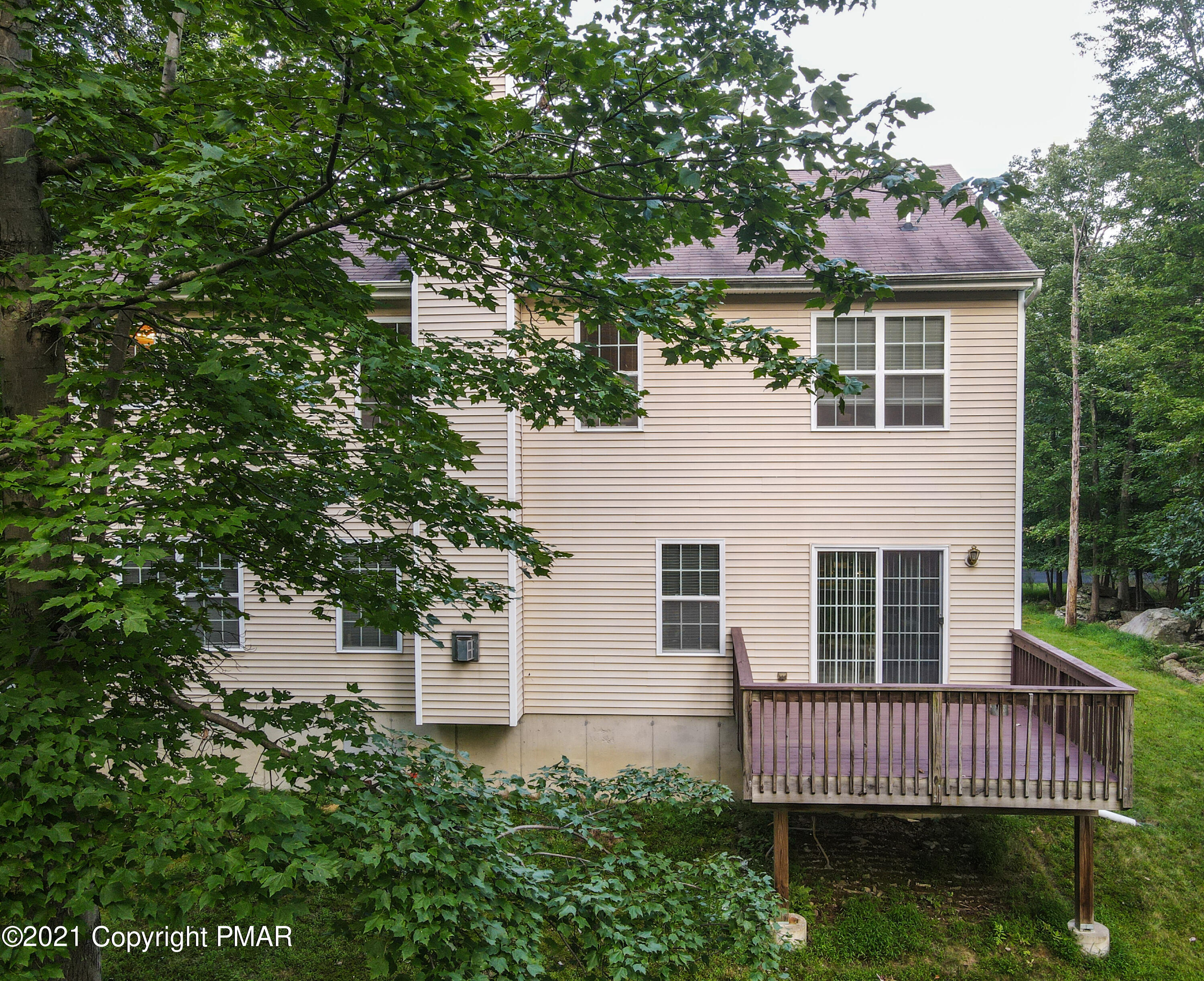 5631 Decker Road Bushkill, PA 18324 - Photo 55 of 61 a view of a house with a roof deck