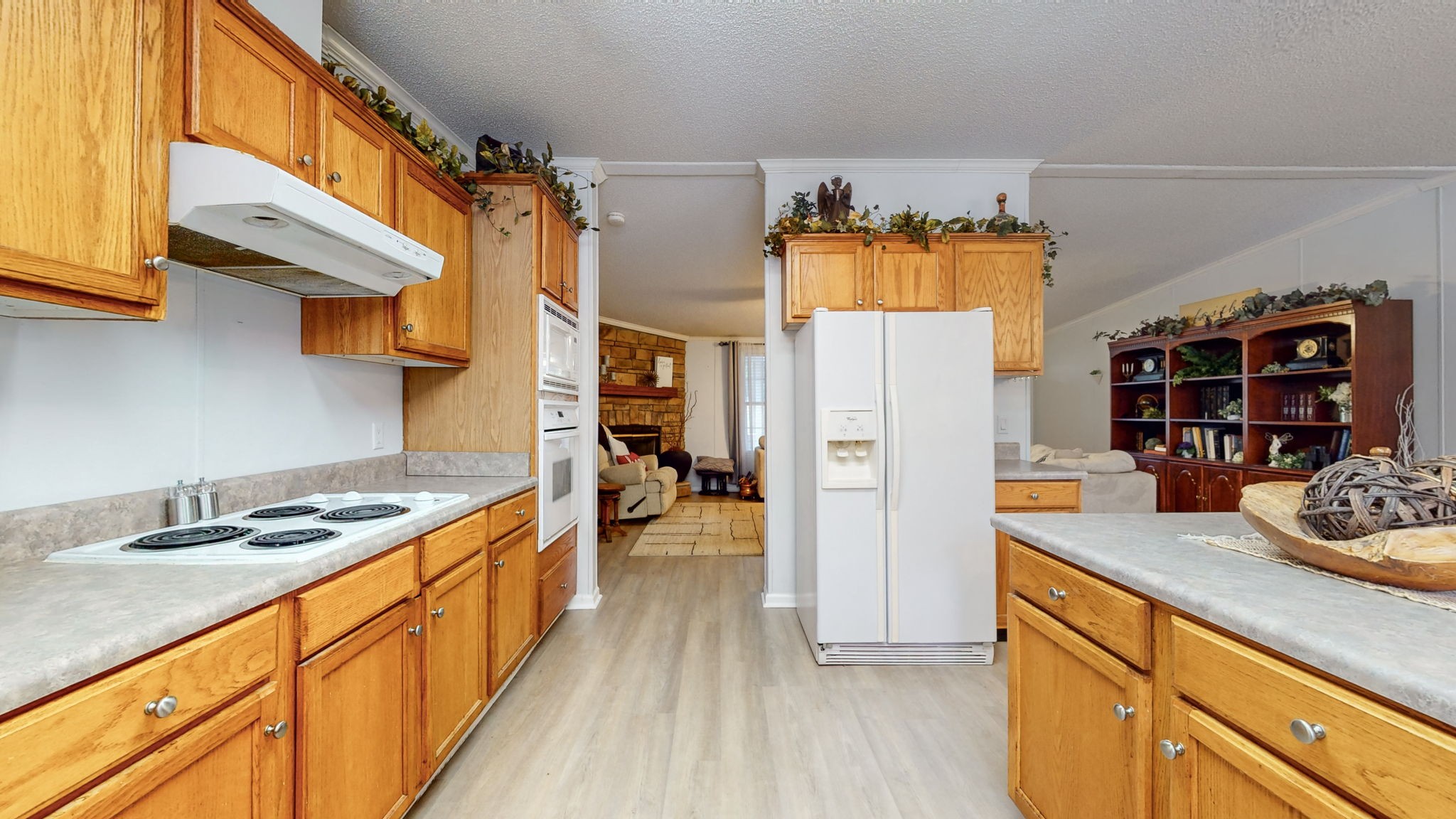 141 Canoe Branch Road Lebanon, TN 37087 - Photo 10 of 51 a kitchen with stainless steel appliances granite countertop a refrigerator a stove and a wooden floor