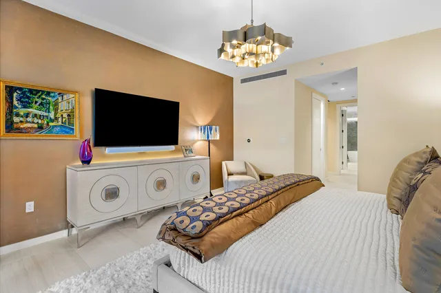 a view of a house with swimming pool and sitting area