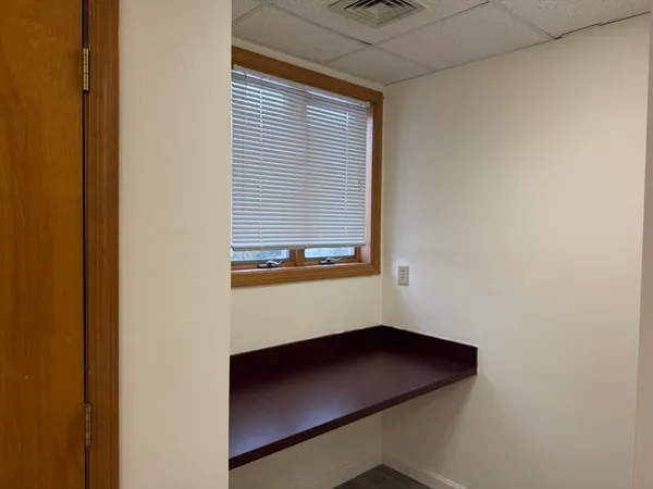 a room with a table and a window
