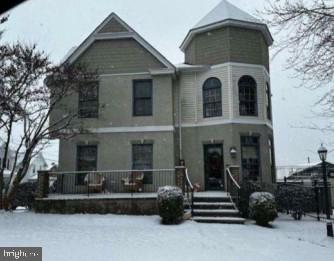1301 Sloan Street Scranton, PA 18504 - Photo 1 of 4 a front view of a house with stairs