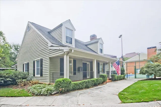 a view of a house with a swimming pool