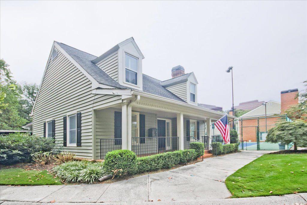 65 Mt Vernon Circle Sandy Springs, GA 30338 - Photo 39 of 44 a front view of a house with a garden and plants