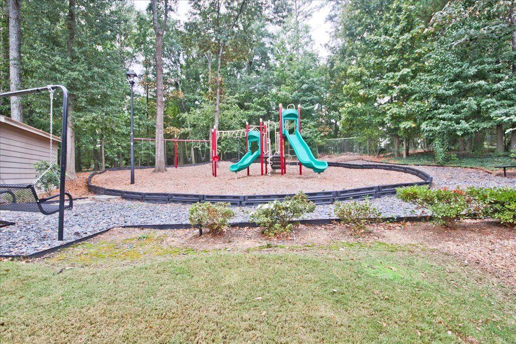 65 Mt Vernon Circle Sandy Springs, GA 30338 - Photo 42 of 44 a view of a backyard with large tree