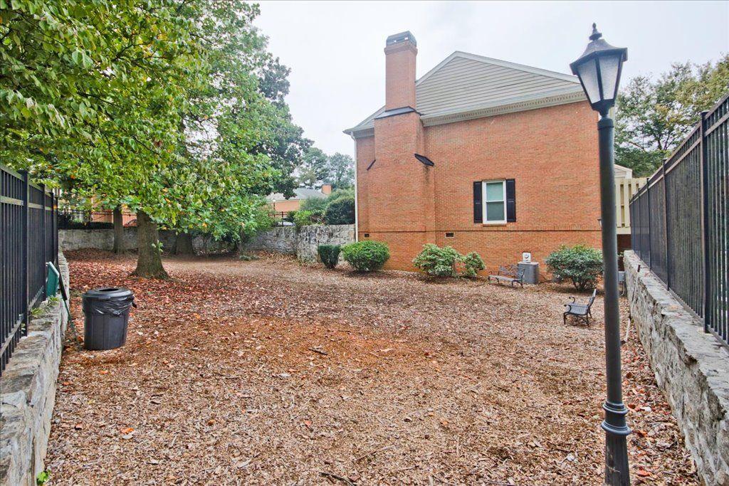 65 Mt Vernon Circle Sandy Springs, GA 30338 - Photo 44 of 44 a backyard of a house with lots of green space