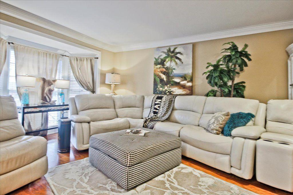 65 Mt Vernon Circle Sandy Springs, GA 30338 - Photo 8 of 44 a living room with furniture and a large window