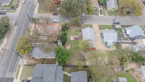 an aerial view of a house with outdoor space